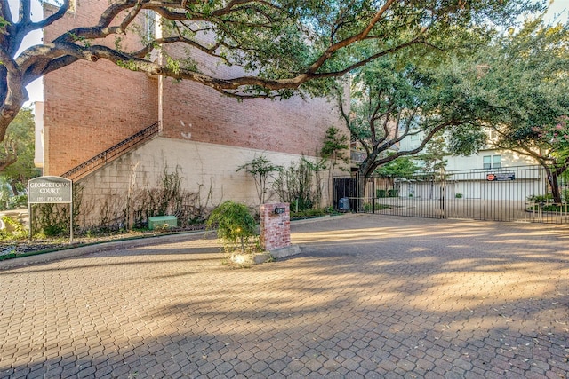 exterior space with fence and a gate