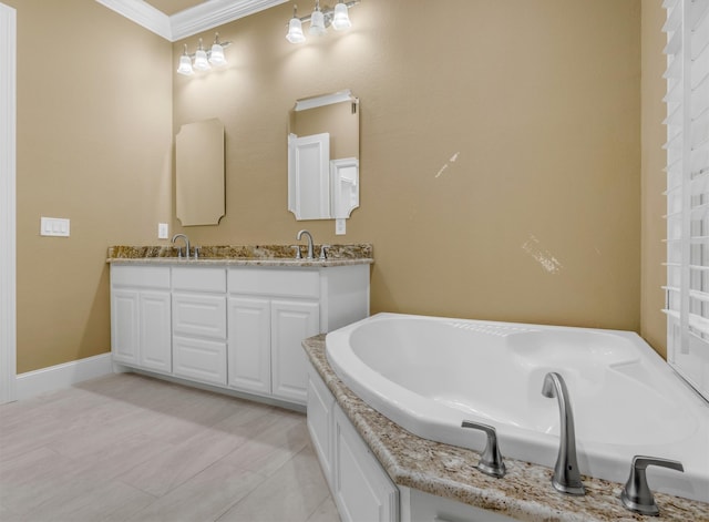 bathroom with vanity, a bathing tub, crown molding, and tile patterned flooring