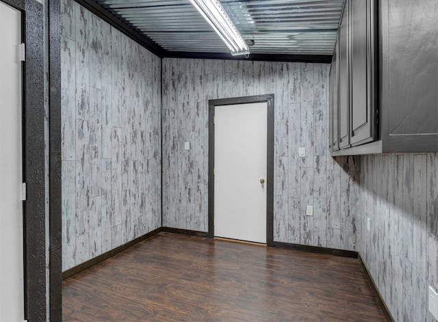 empty room featuring dark hardwood / wood-style flooring