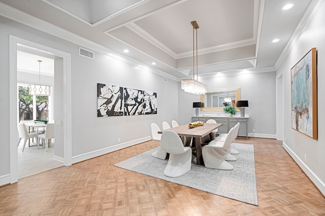 dining area featuring light parquet floors and ornamental molding