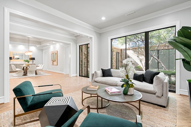 living room with light parquet flooring and ornamental molding