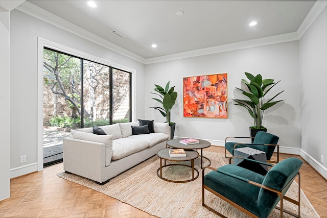 living room with crown molding and light parquet flooring