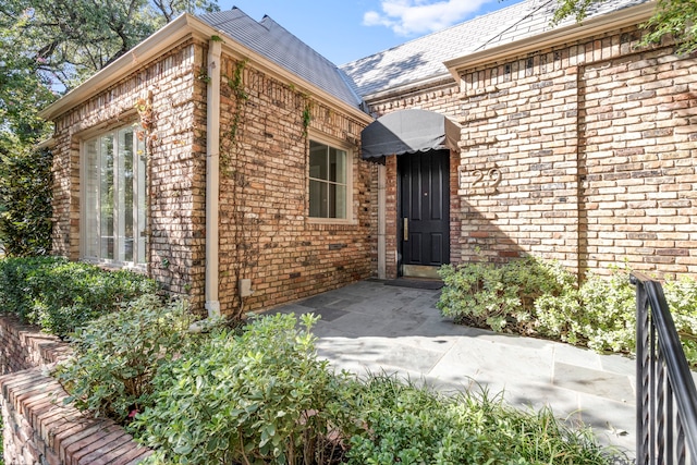 doorway to property featuring a patio area