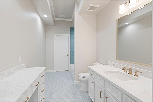 bathroom with tile patterned floors, crown molding, vanity, and toilet