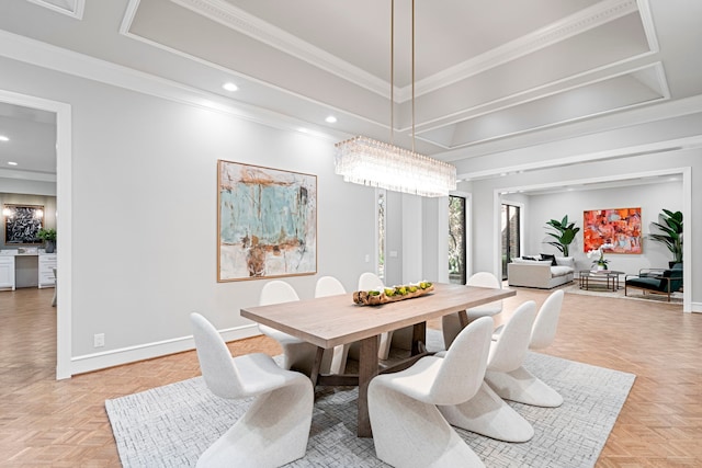 dining room featuring light parquet floors and crown molding