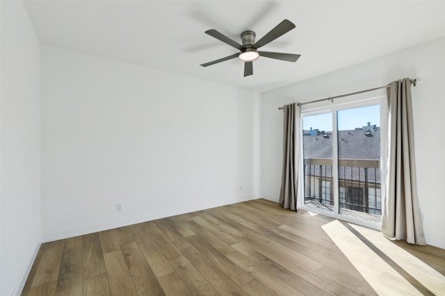 unfurnished room featuring ceiling fan and light hardwood / wood-style floors