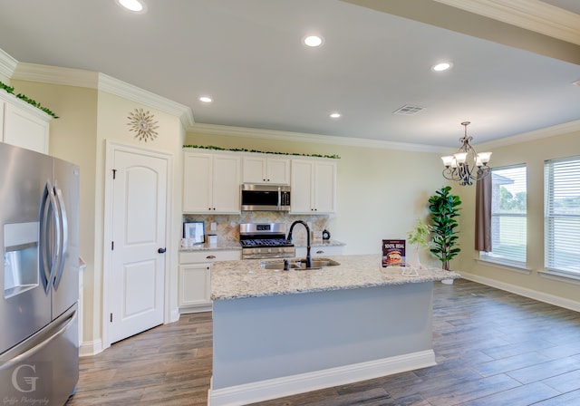 kitchen featuring appliances with stainless steel finishes, dark hardwood / wood-style floors, sink, and white cabinetry