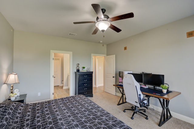 carpeted bedroom featuring ceiling fan