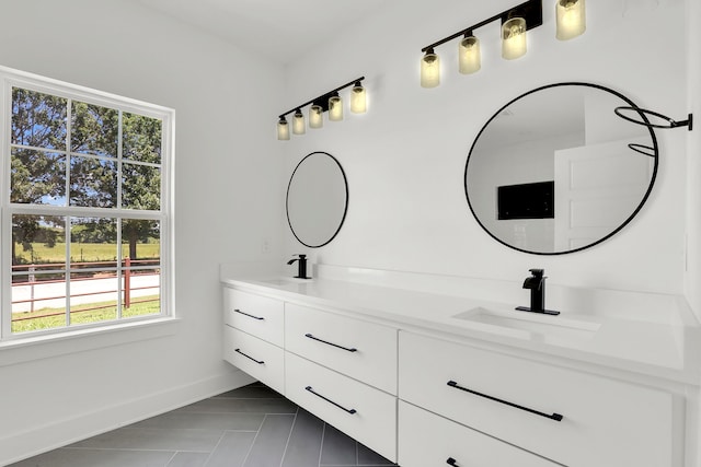 bathroom featuring vanity, plenty of natural light, and tile patterned floors