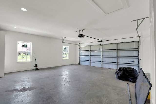 garage featuring a garage door opener