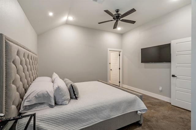 carpeted bedroom featuring ceiling fan and vaulted ceiling