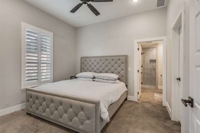 bedroom with concrete floors, ceiling fan, and ensuite bathroom