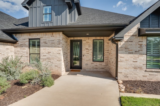 doorway to property featuring a patio area