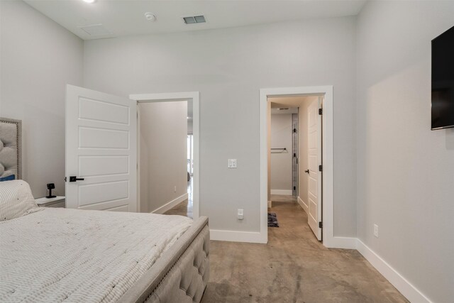 bedroom featuring light carpet