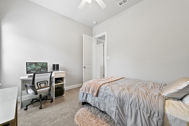 bedroom featuring light carpet, ceiling fan, and vaulted ceiling