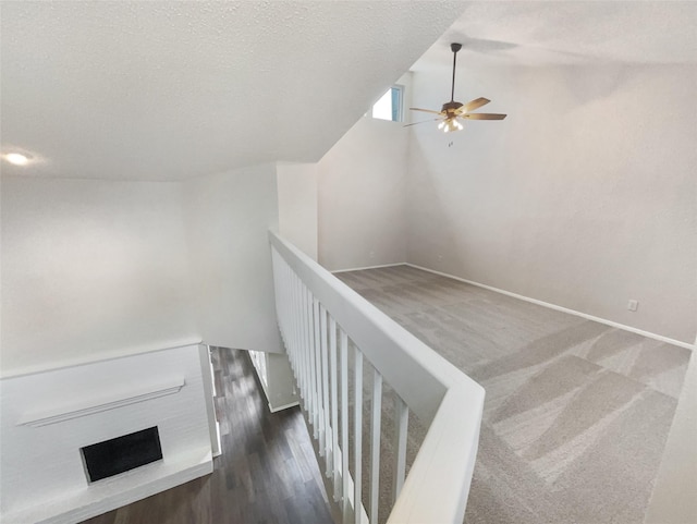 313 Oak Shadow Cir, Bedford, TX 76021 - stairway featuring vaulted ceiling, baseboards, and ceiling fan