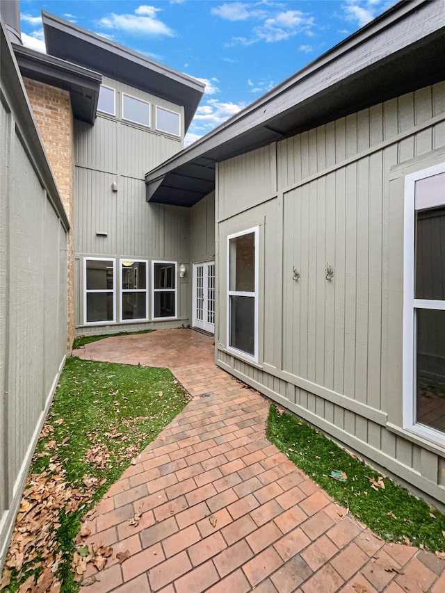 313 Oak Shadow Cir, Bedford, TX 76021 - back of property featuring a patio