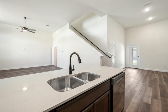 kitchen featuring ceiling fan, sink, high vaulted ceiling, stainless steel dishwasher, and light hardwood / wood-style floors