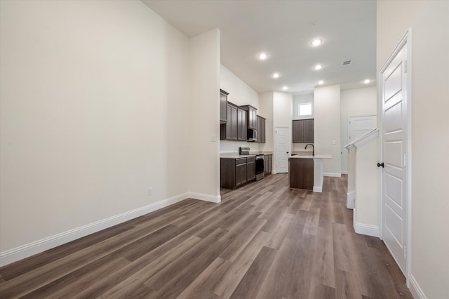 unfurnished living room featuring hardwood / wood-style floors