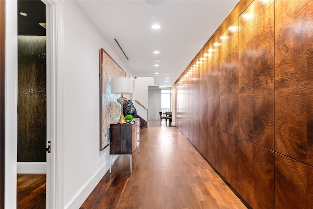 corridor featuring wood-type flooring