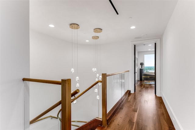 hall with dark hardwood / wood-style floors