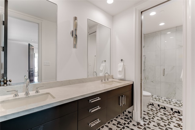 bathroom with walk in shower, vanity, toilet, and tile patterned floors