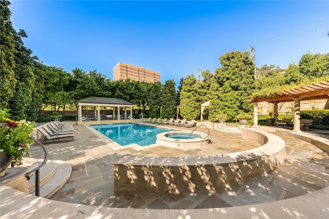 view of pool with a hot tub, a patio, and a gazebo