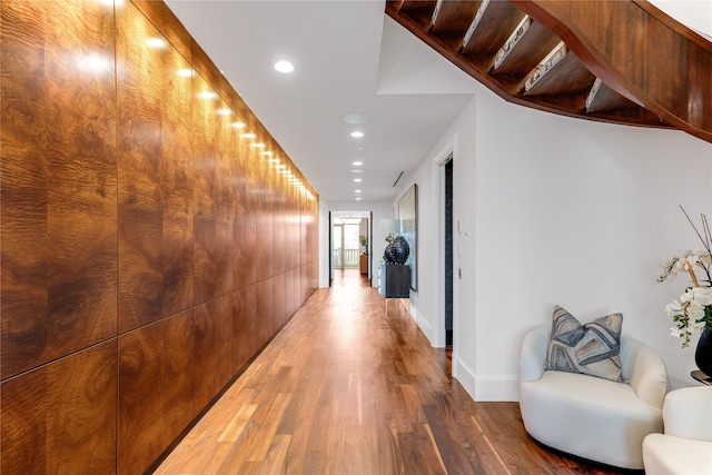 corridor with wood-type flooring