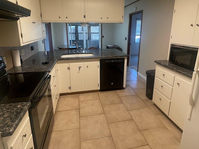 kitchen with black appliances, a sink, white cabinets, and under cabinet range hood