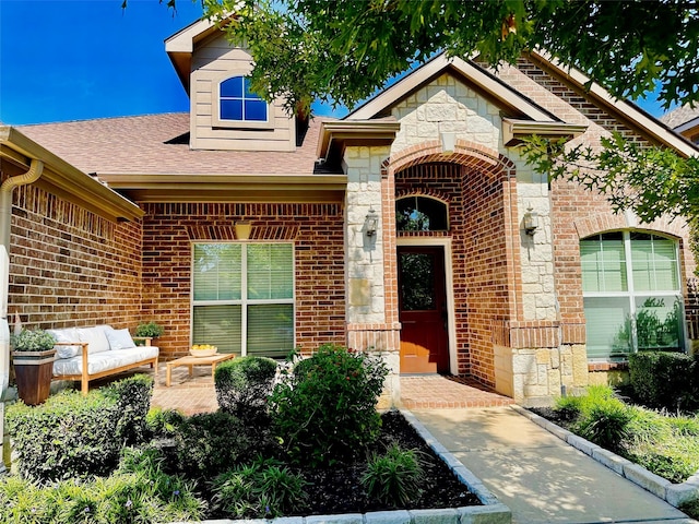 view of front of property with an outdoor living space