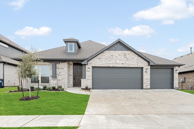 438 Aspen Way, Lavon, TX 75166 - view of front of house featuring a garage, brick siding, a front lawn, concrete driveway, and roof with shingles