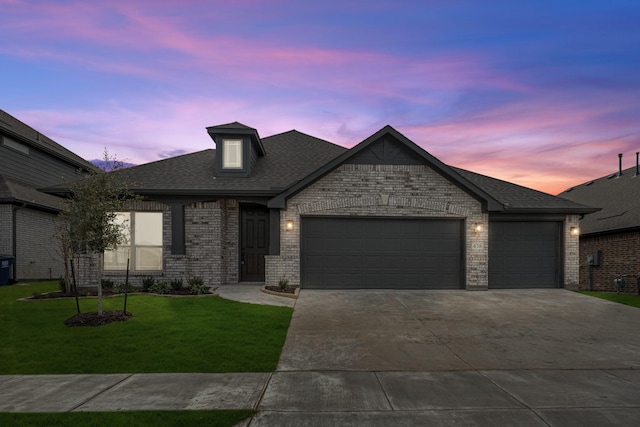 438 Aspen Way, Lavon, TX 75166 - french provincial home with an attached garage, brick siding, a yard, concrete driveway, and roof with shingles