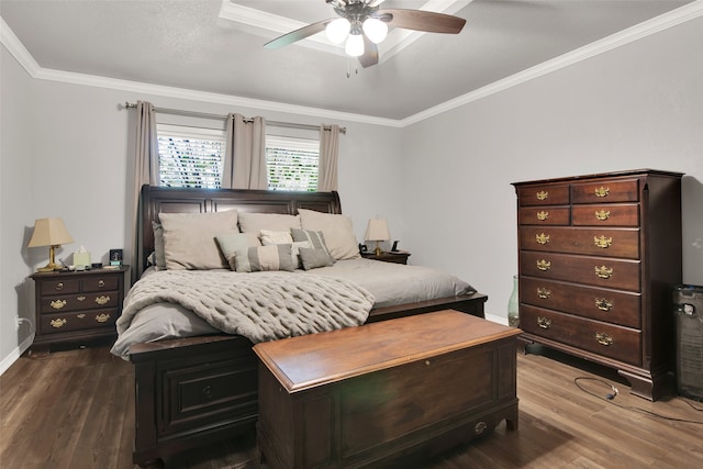 bedroom with ornamental molding, wood-type flooring, and ceiling fan