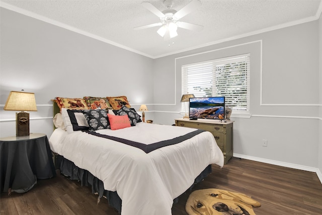 bedroom featuring ceiling fan, a textured ceiling, crown molding, and dark wood-type flooring