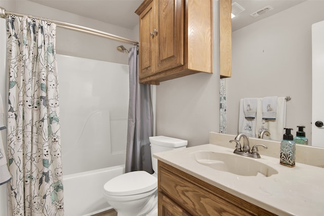 full bathroom with shower / bathtub combination with curtain, vanity, and toilet