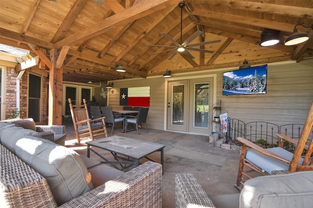 view of patio with a gazebo, an outdoor living space, ceiling fan, and french doors