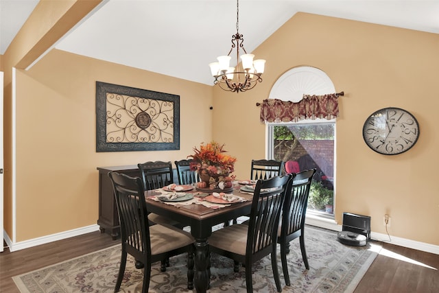 dining room with vaulted ceiling, a notable chandelier, and hardwood / wood-style floors