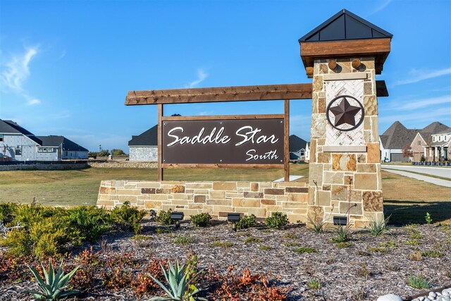 view of community sign