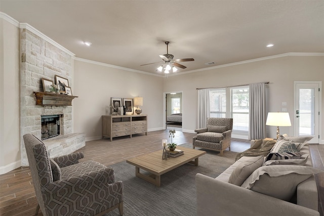 foyer with dark wood-type flooring, plenty of natural light, and crown molding