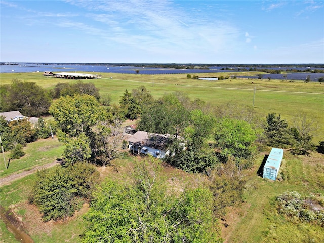 aerial view featuring a rural view and a water view