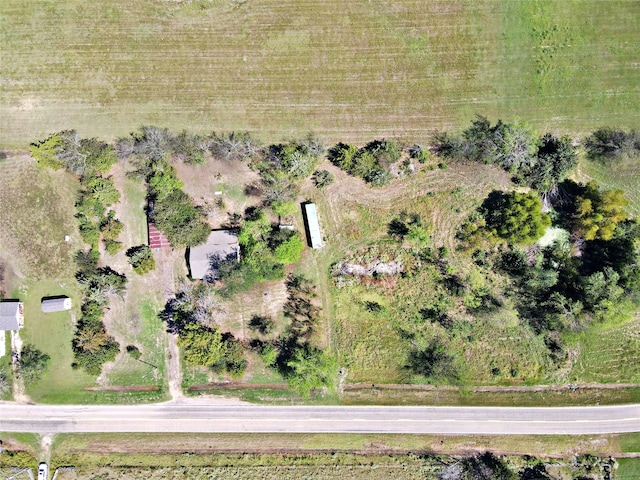 birds eye view of property featuring a rural view