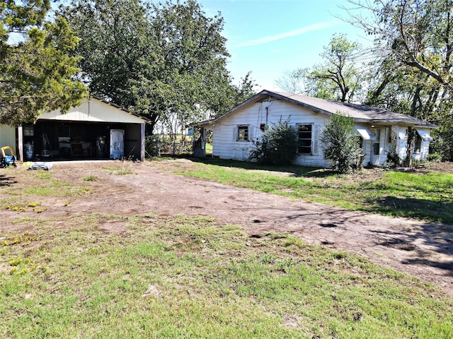 exterior space with an outbuilding