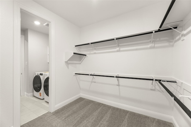 1008 Roys Dr, Rockwall, TX 75087 - spacious closet with washing machine and dryer and carpet