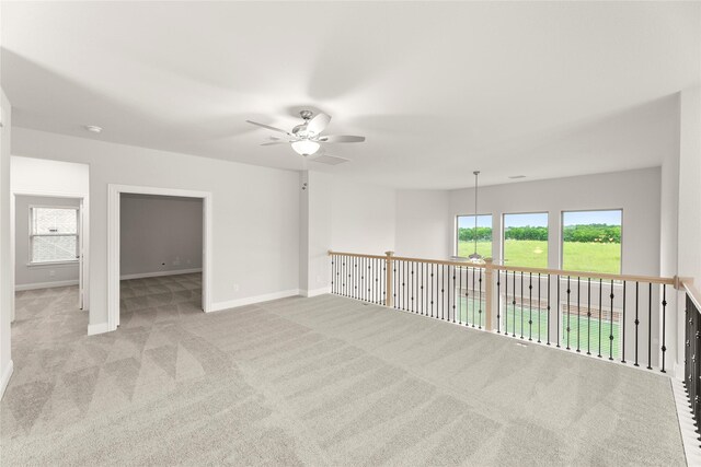 1008 Roys Dr, Rockwall, TX 75087 - empty room with ceiling fan, carpet floors, and baseboards