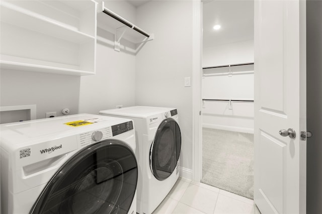 1008 Roys Dr, Rockwall, TX 75087 - washroom featuring independent washer and dryer, light carpet, baseboards, and light tile patterned floors