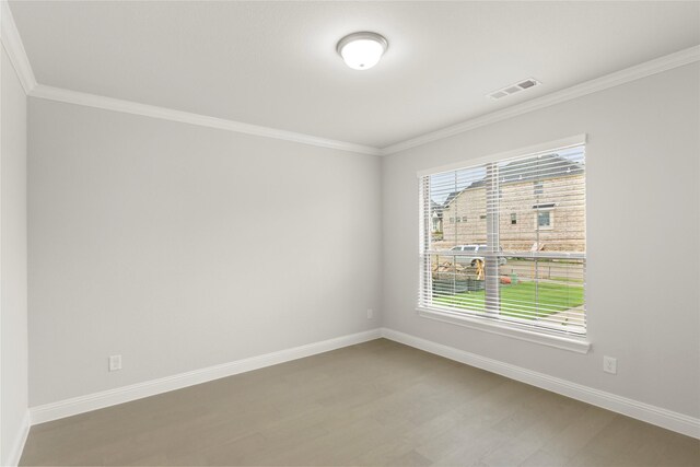 1008 Roys Dr, Rockwall, TX 75087 - unfurnished room featuring crown molding, baseboards, and wood finished floors