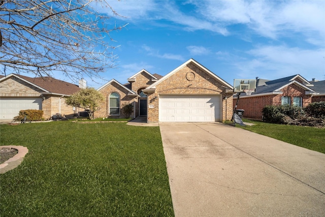 ranch-style house with a garage and a front yard