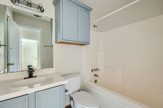 full bathroom with vanity, toilet, and bathtub / shower combination