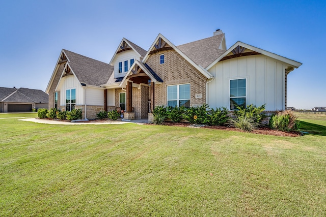 craftsman-style home featuring a front yard