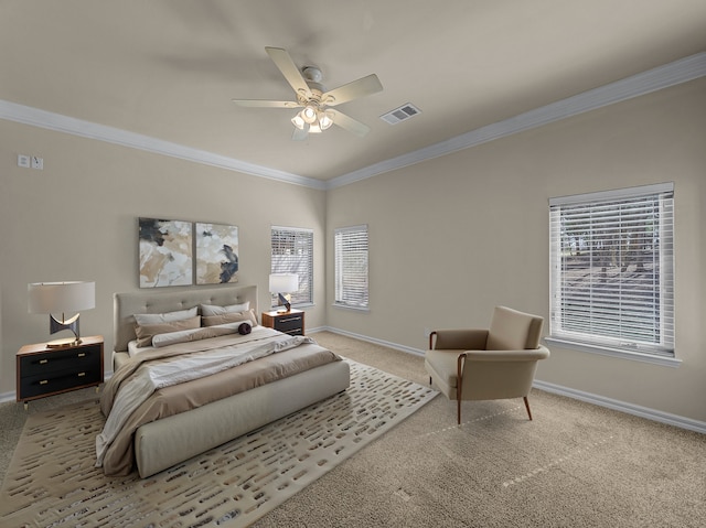 bedroom with carpet floors, ornamental molding, visible vents, and baseboards